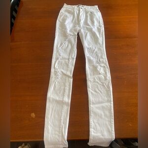 White skinny jeans with rips